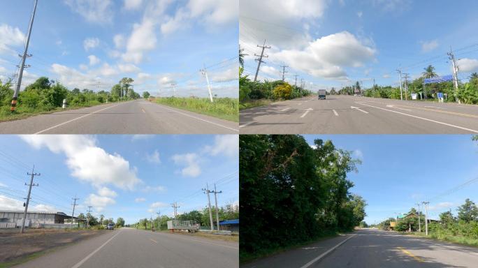 Timelapse：在白天天空乌云密布的乡村公路上驾驶。