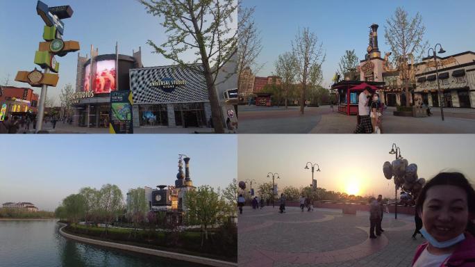 北京旅游夕阳下的环球影城拍照游人旅游