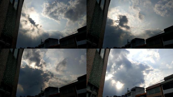 从房屋顶上飘过的流云落日夕阳行走的乌云