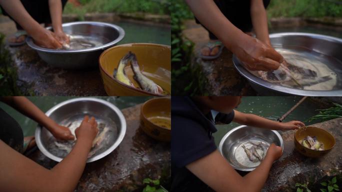 小孩子 清洗食材 鱼