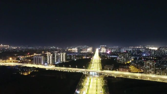 夜晚城市航拍飞行器大街繁华高楼大厦俯瞰