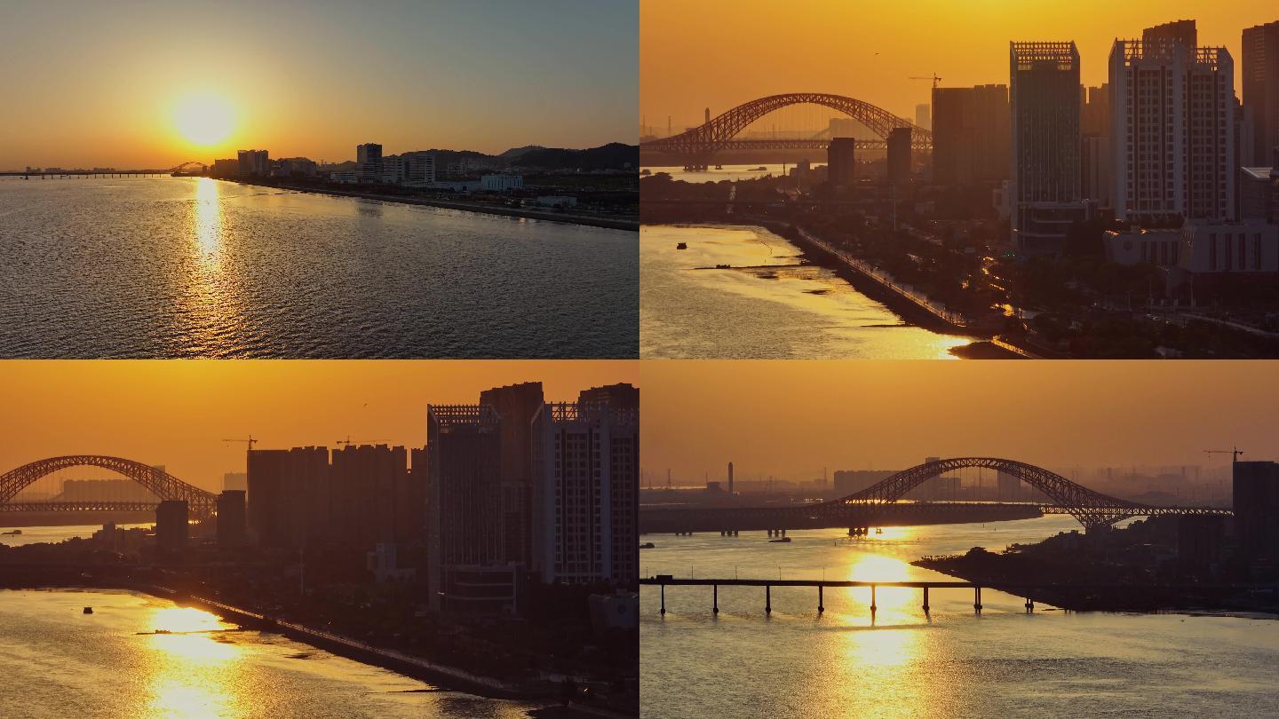 4K航拍海边夕阳黄昏日落的明珠湾大桥