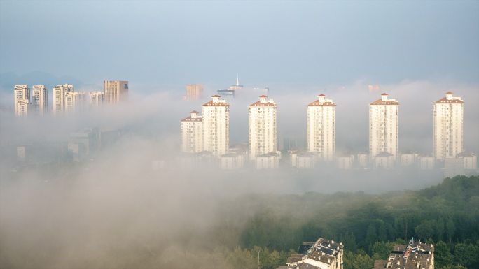 4K河南信阳城市天际线平流雾云海延时