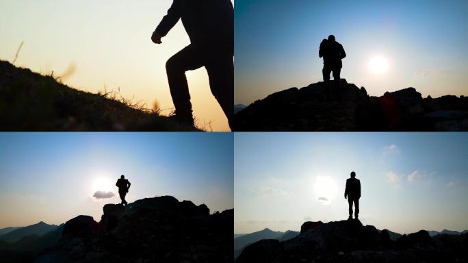 勇攀高峰男人奔跑登顶登山张开双臂拥抱蓝天