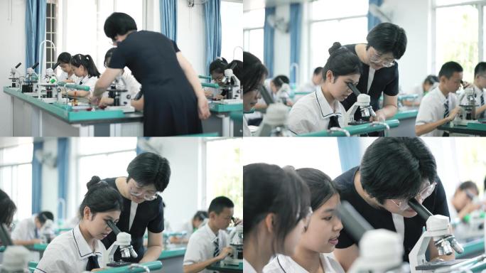 老师带学生看显微镜