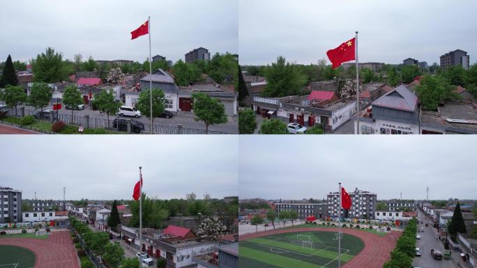 航拍国旗飘扬 足球场 求是小学 学校