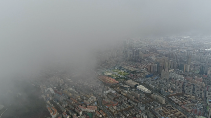 城市广场建筑大连人民广场平流雾穿云航拍