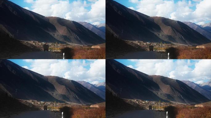 西藏风光视频公路上斑驳光影山体汽车
