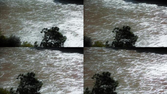 江河水视频江河波光粼粼水面汹涌的流水