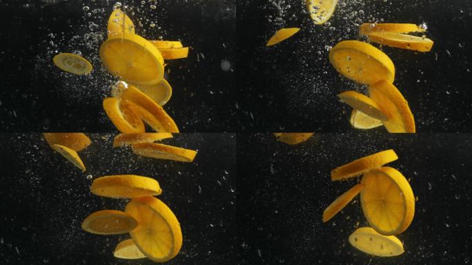 升格慢镜头新鲜橙子掉进入水中写意动态视频