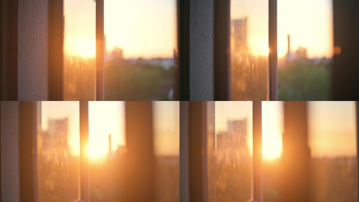 日落美景模糊小时从室内窗户到城市景观的神奇时刻
