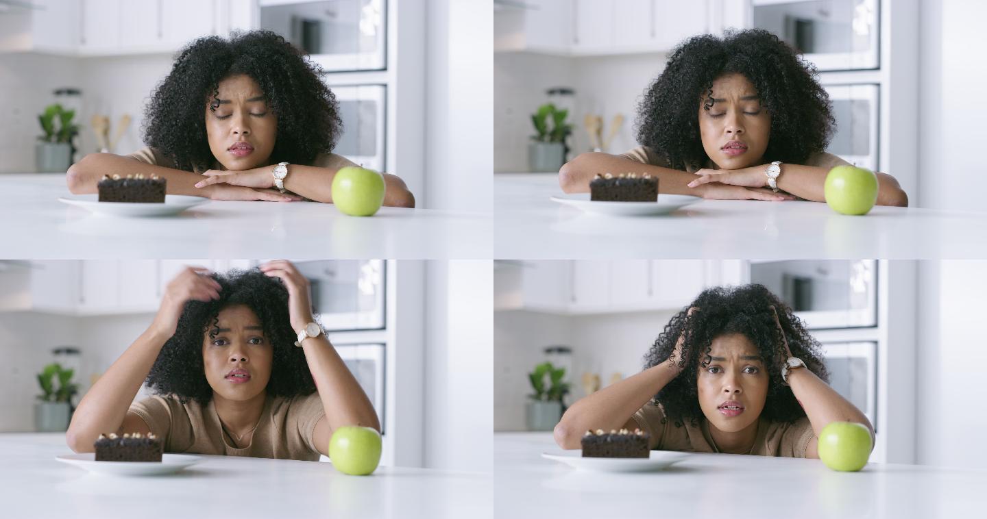 一名年轻女子决定在家里吃苹果还是巧克力布朗尼的4k视频片段