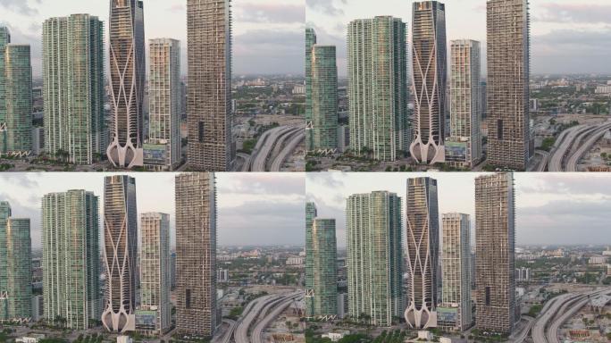 迈阿密黎明的天际线。无人机通过复杂的向后平移电影摄影机运动制作视频。