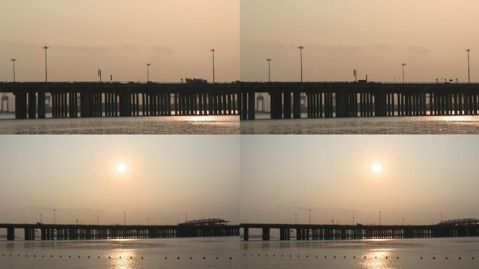 广深沿江高速公路夕阳下的车流和前海收费站