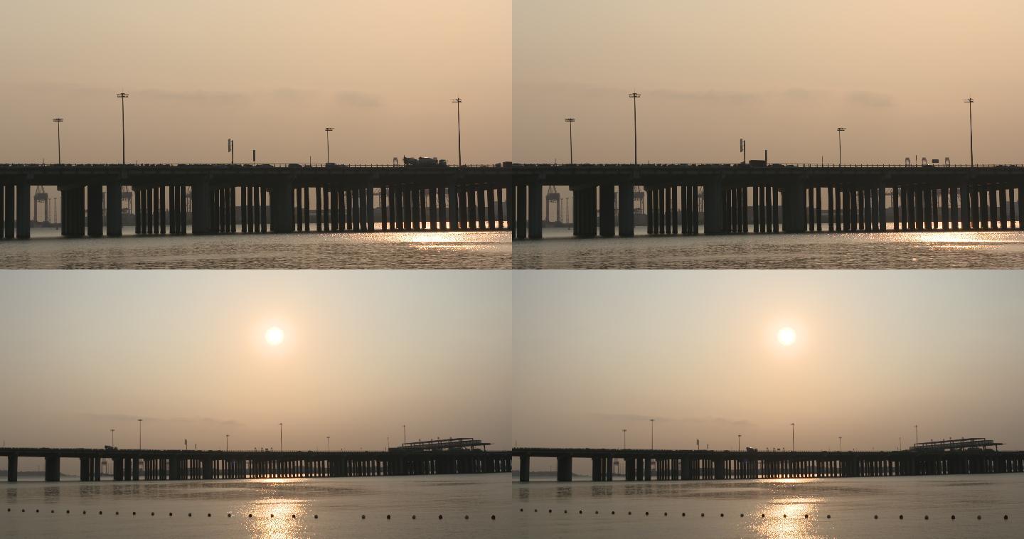 广深沿江高速公路夕阳下的车流和前海收费站