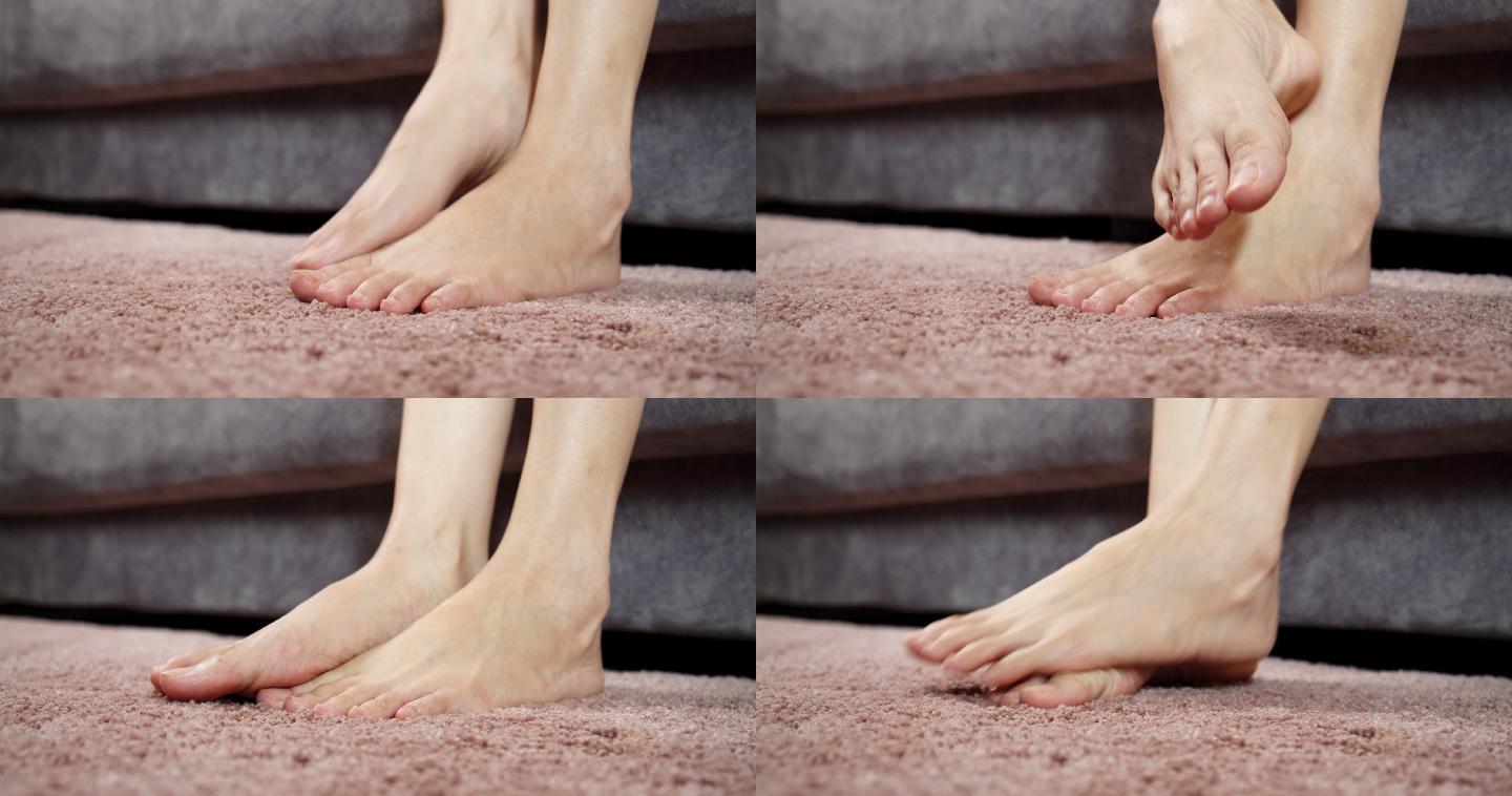 4k分辨率的亚洲女性坐在家里的沙发上，赤脚用手抓挠发痒的皮肤。虫咬痛。医疗保健概念。