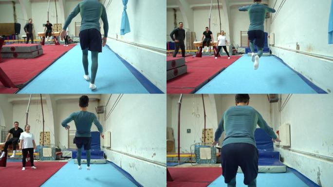 在一次后空翻后，男体操运动员完成了完美的落地