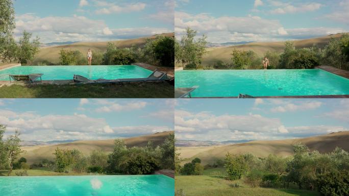 托斯卡纳地区，一名空中女子跳进她田园诗般的度假别墅的游泳池