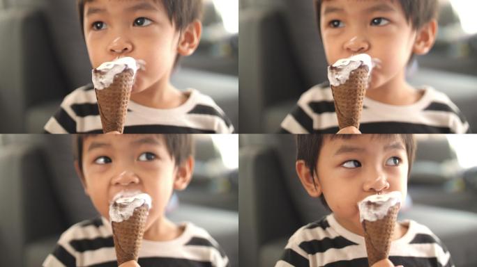 亚洲小男孩在家吃冰淇淋