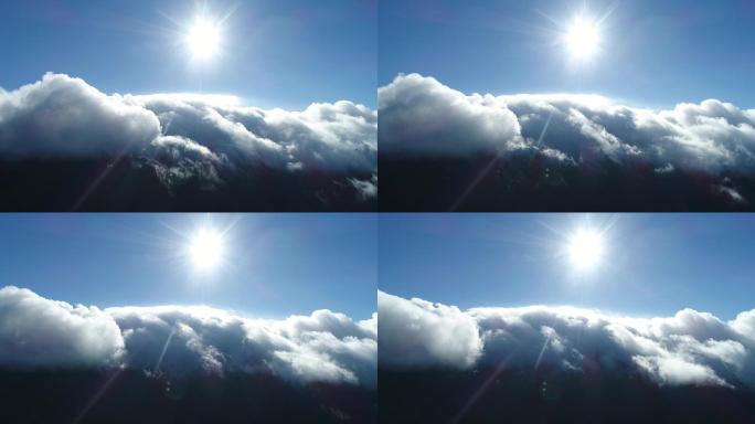蓝天白云高海拔云层运动及明亮太阳