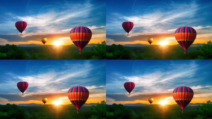 夏日日落时彩色热气球飞过的鸟瞰图。