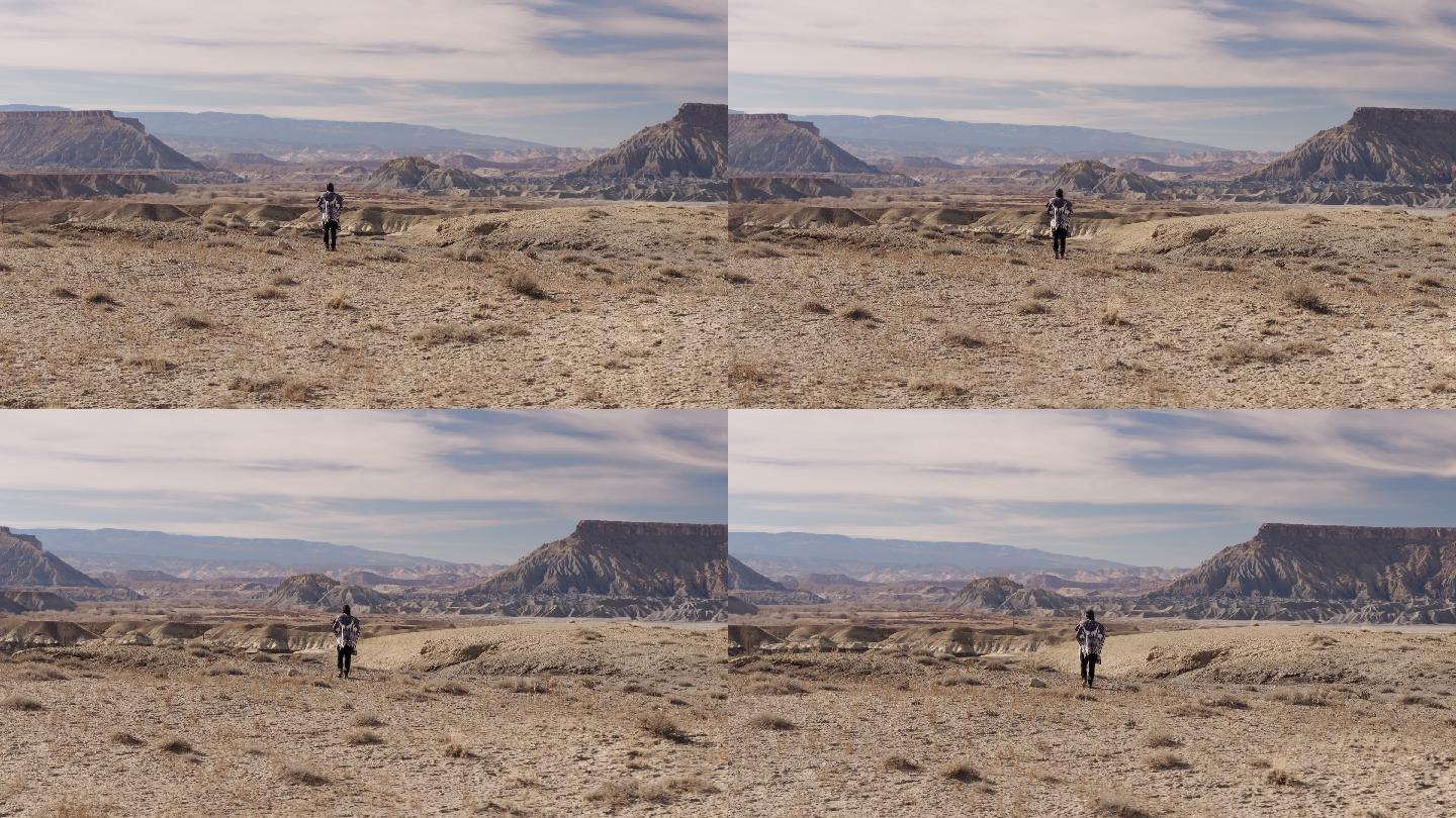 犹他沙漠中一个孤独的人在眺望风景-空中
