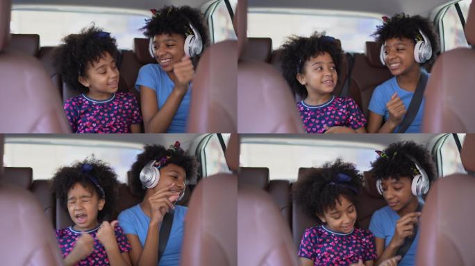 坐在汽车后座唱歌的姐妹们