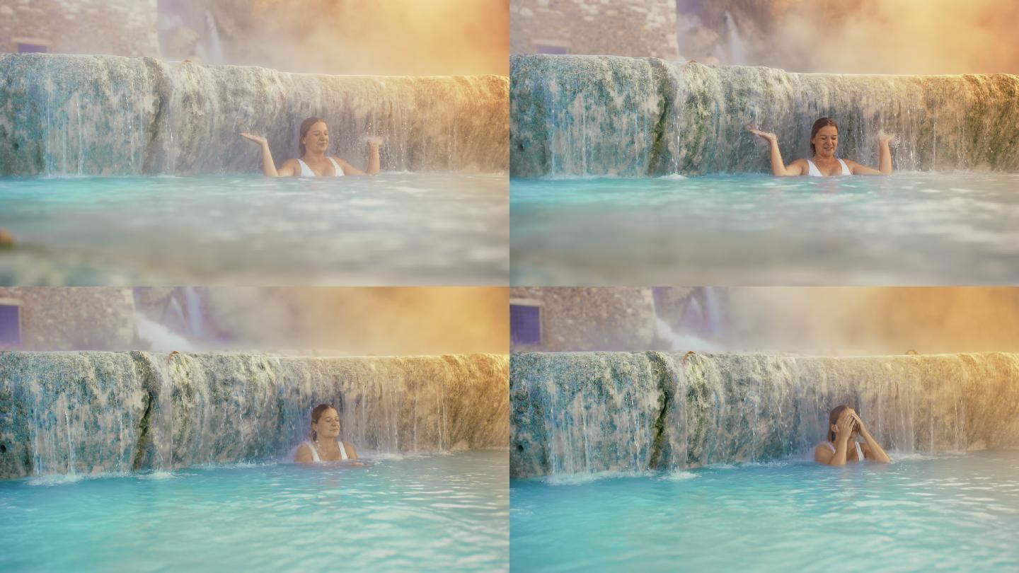SLO MO Woman在Saturnia温泉享受热水瀑布