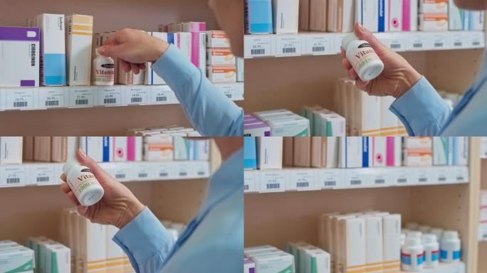 女士伸手去药店货架上的维生素瓶，检查标签