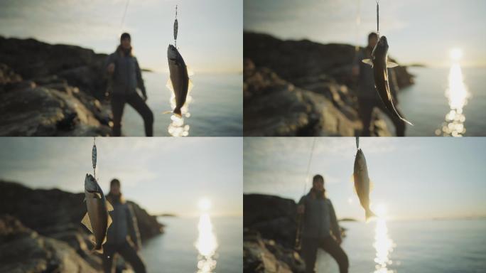 挪威户外：妇女在海上用鱼竿旋转钓鱼
