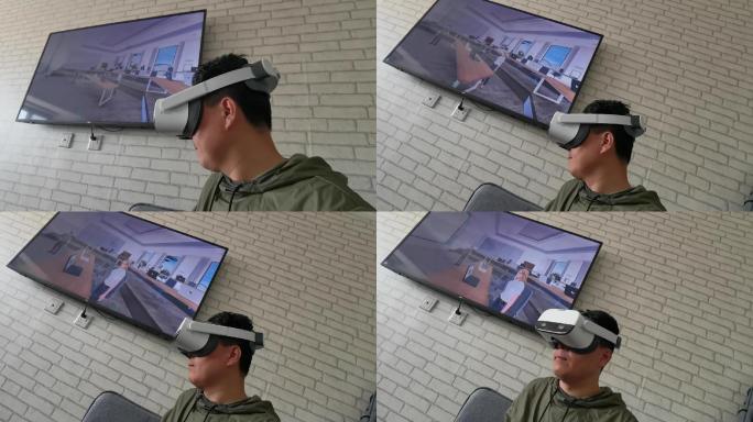 体验VR会议室的男人