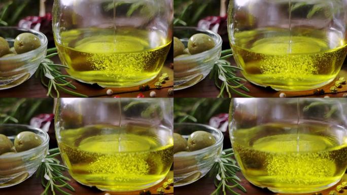 多莉的慢镜头：在乡村厨房里把橄榄油倒进瓶子里，锅里放着橄榄
