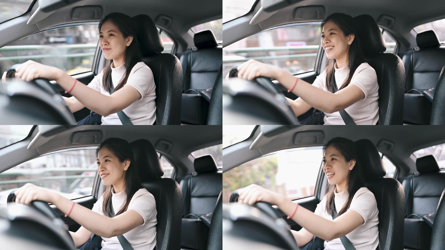 亚洲女性开车上班时在车内使用手机无线蓝牙