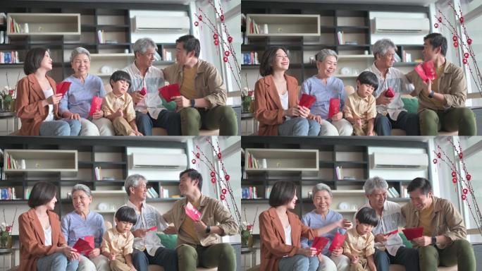 春节团圆夫妇带着孩子去爷爷奶奶家，给父母送红包红包