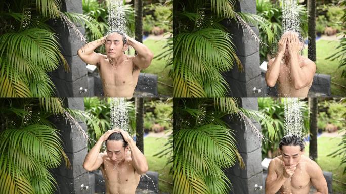 慢动作亚裔中国男子在进入游泳池游泳前穿着泳衣淋浴