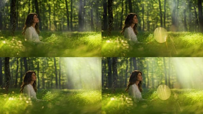 斯洛-莫年轻女子在雾绿色森林中冥想