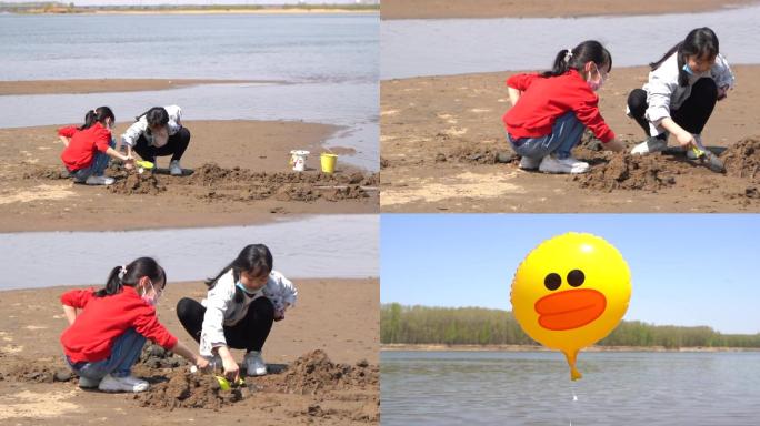 休闲娱乐小孩水边玩沙子沙滩卡通小黄鸭气球