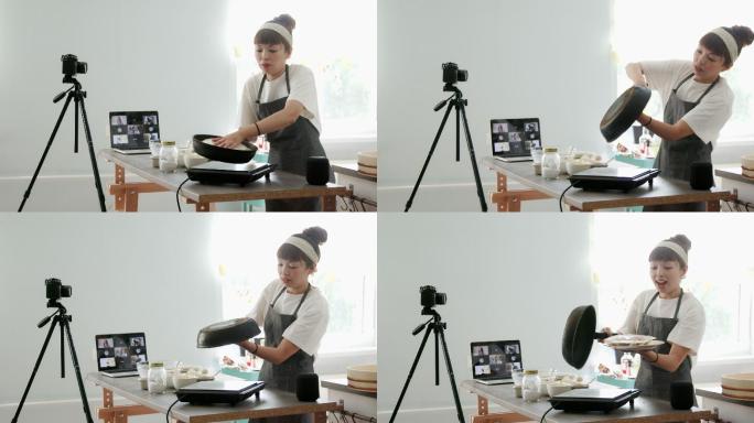 日本女性家庭电视厨师制作gyozas
