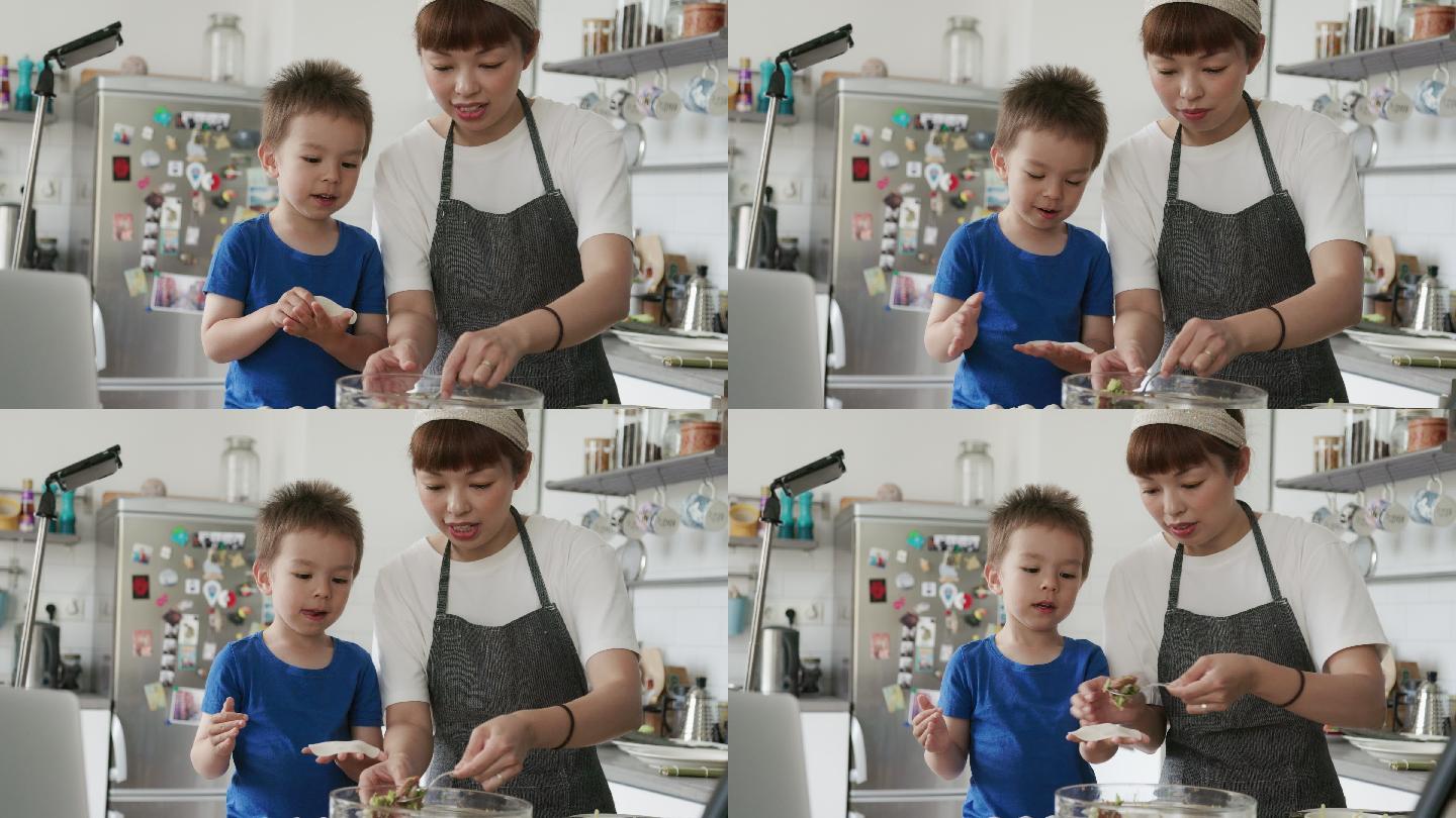 日本女厨师在虚拟烹饪课上与儿子一起制作gyozas