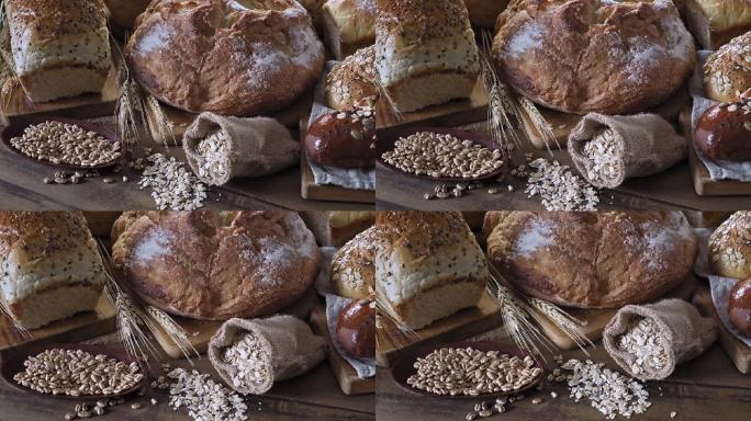 慢镜头拍摄一组新鲜面包和烘焙食品的特写镜头。手工烘焙店