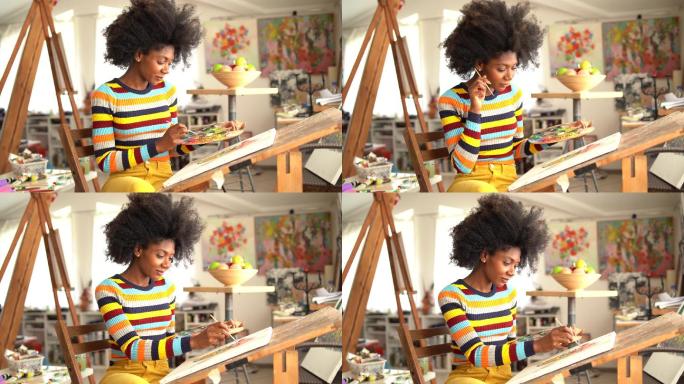 4K视频天才非裔美国年轻女画家用油画创作艺术品