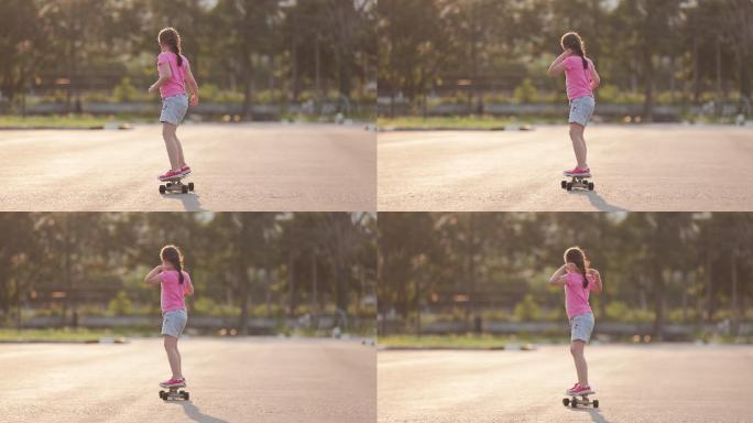 可爱快乐的小女孩戴着外科口罩在日落时玩滑板