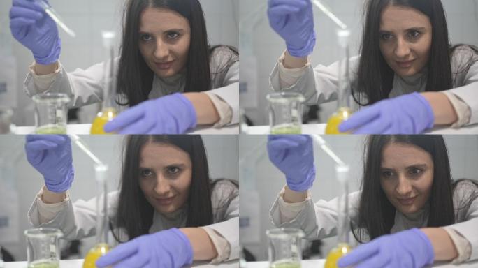 女实验室工作人员进行新化学实验的慢动作视频
