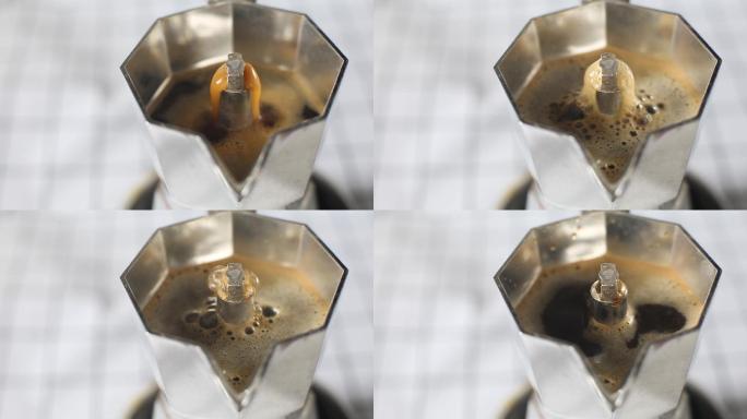 摩卡壶煮咖啡油脂泡沫沸腾过程特写