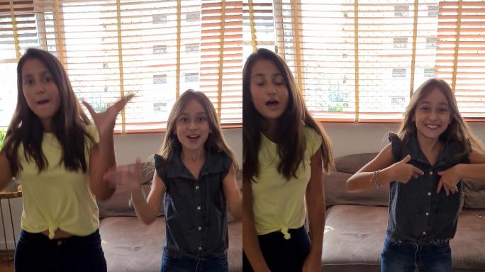 姐妹们在家里为社交媒体跳舞——手机摄像头视角