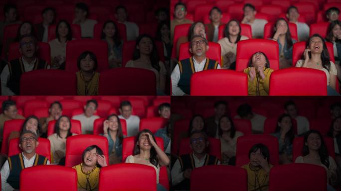 亚裔华人活跃的老人和他的孙女喜欢在电影院看电影