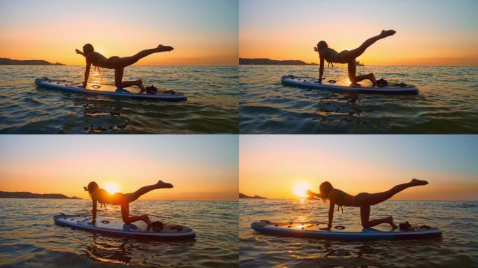 太阳下山的时候，一位名叫斯洛-莫的女子在海上用桨板做瑜伽