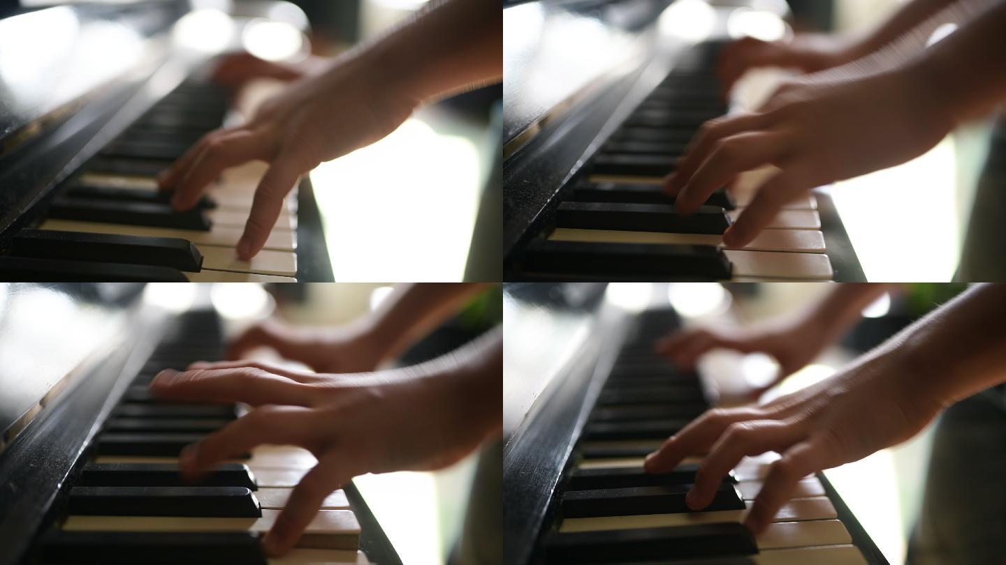 少年弹钢琴弹钢琴手指特写