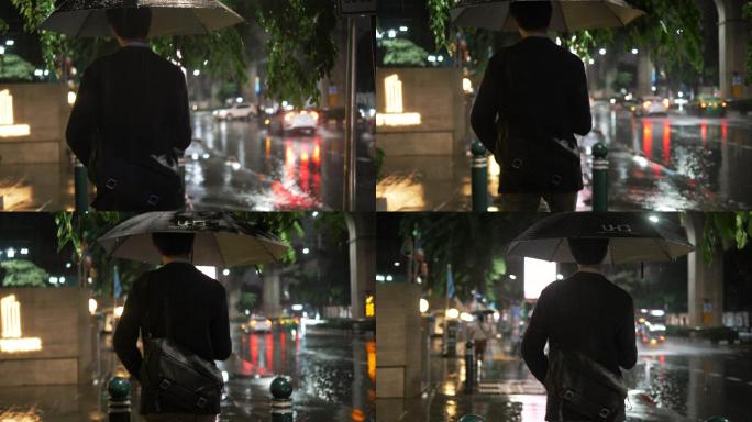 下雨时带着雨伞走路的年轻人