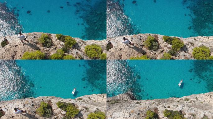 4k视频无人机希腊Zakynthos悬崖附近的无人机操作员